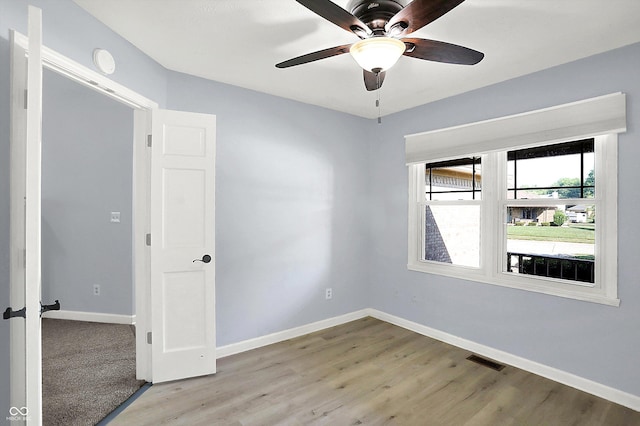 6059 Buck Blvd, Indianapolis, IN 46237 - spare room featuring ceiling fan and wood finished floors