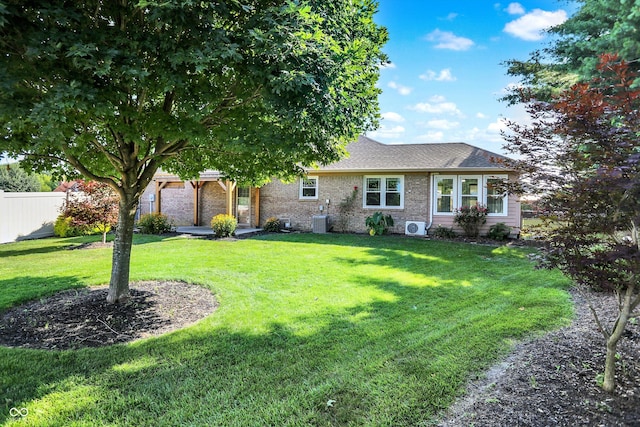 6059 Buck Blvd, Indianapolis, IN 46237 - view of front facade featuring brick siding and roof with shingles