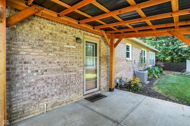6059 Buck Blvd, Indianapolis, IN 46237 - view of exterior entry featuring a patio and brick siding