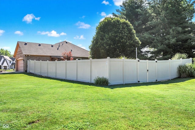 6059 Buck Blvd, Indianapolis, IN 46237 - view of yard featuring an attached garage