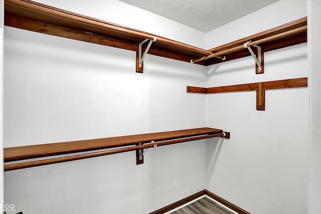 6059 Buck Blvd, Indianapolis, IN 46237 - spacious closet with wood finished floors