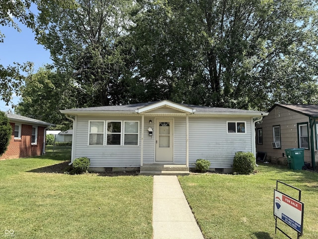 314 E Mill St, Fortville, IN 46040 - view of front of home with crawl space and a front lawn