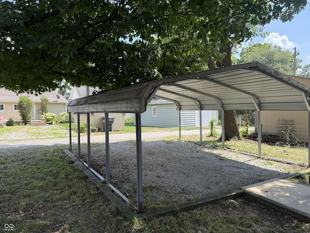 314 E Mill St, Fortville, IN 46040 - view of parking with a detached carport