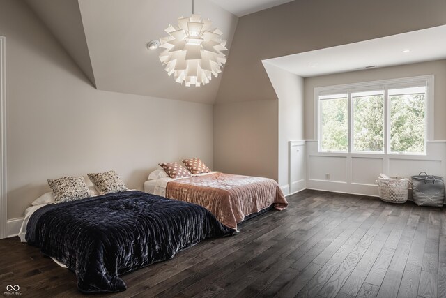 520 Willow Spring Rd, Indianapolis, IN 46240 - bedroom with a chandelier, dark wood-style floors, and lofted ceiling