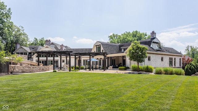 520 Willow Spring Rd, Indianapolis, IN 46240 - rear view of property with a pergola, a yard, a chimney, and a patio