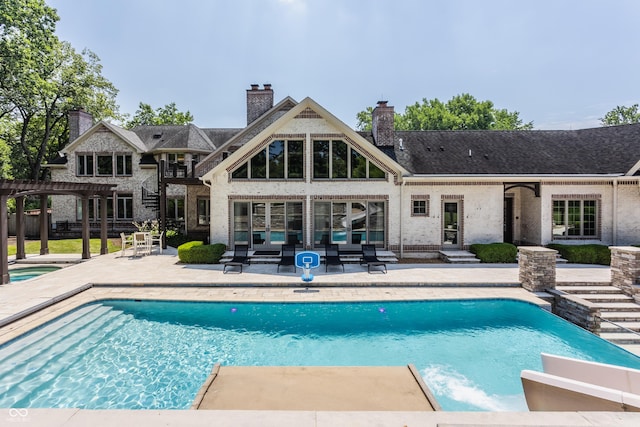 520 Willow Spring Rd, Indianapolis, IN 46240 - swimming pool with a patio area, a pergola, and an outdoor living space