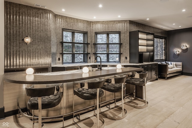 520 Willow Spring Rd, Indianapolis, IN 46240 - bar area featuring light wood-type flooring and recessed lighting