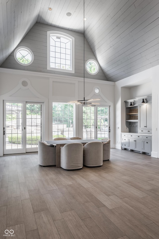 520 Willow Spring Rd, Indianapolis, IN 46240 - living room with high vaulted ceiling, wood ceiling, and light wood-style floors
