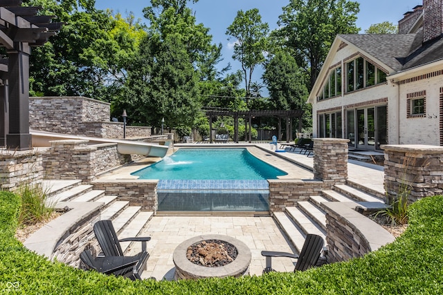 520 Willow Spring Rd, Indianapolis, IN 46240 - swimming pool with a pergola, a patio area, and french doors