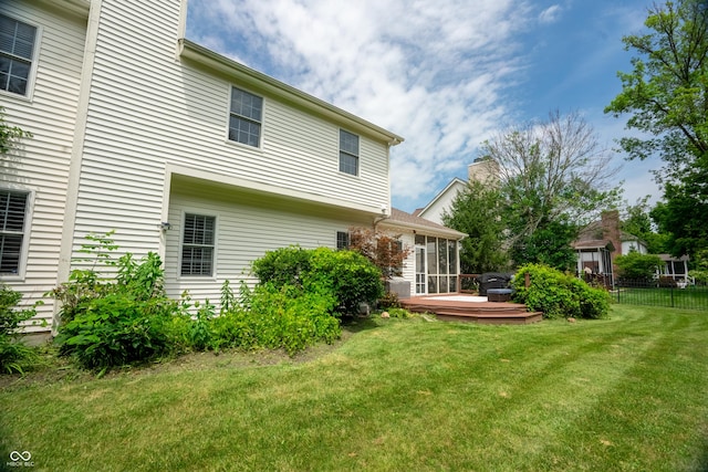 12817 Mojave Dr, Fishers, IN 46037 - rear view of property featuring a deck and a sunroom