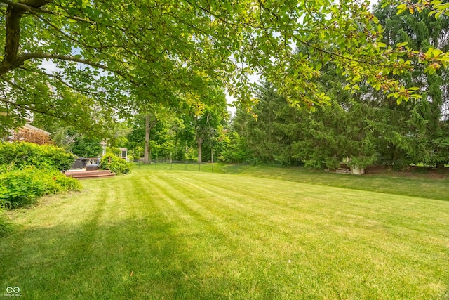 12817 Mojave Dr, Fishers, IN 46037 - view of yard featuring a wooden deck