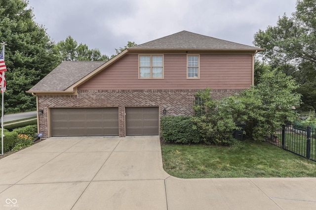 860 Old Eagle Way, Greenwood, IN 46143 - view of side of property with brick siding, concrete driveway, a shingled roof, and an attached garage