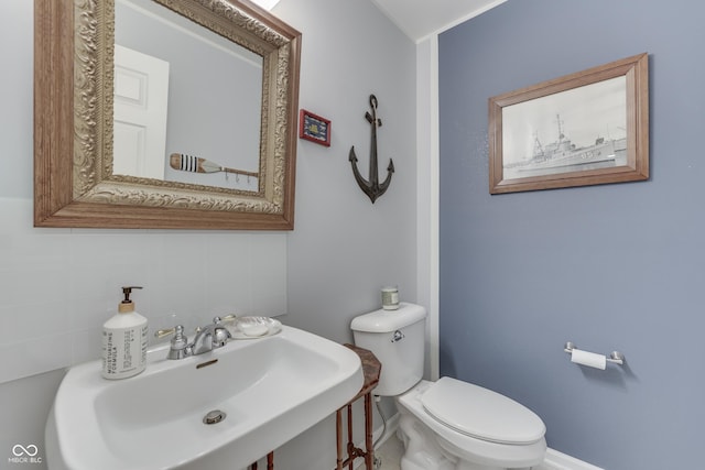 860 Old Eagle Way, Greenwood, IN 46143 - half bathroom with a sink and backsplash