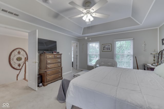 860 Old Eagle Way, Greenwood, IN 46143 - bedroom with carpet floors, a tray ceiling, and a ceiling fan