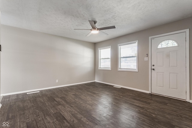 4880 N Katherine Dr, Indianapolis, IN 46226 - foyer entrance with ceiling fan, a textured ceiling, and dark wood-style floors