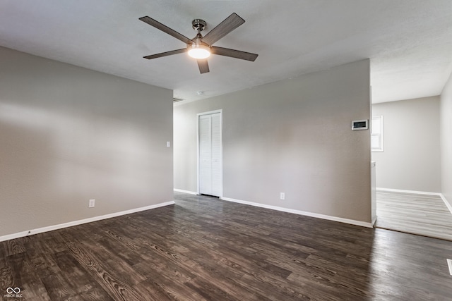 4880 N Katherine Dr, Indianapolis, IN 46226 - empty room featuring a ceiling fan and dark wood finished floors