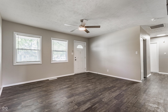 4880 N Katherine Dr, Indianapolis, IN 46226 - entryway featuring dark wood-style floors, a ceiling fan, and a textured ceiling