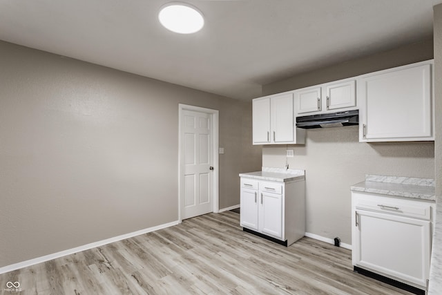 4880 N Katherine Dr, Indianapolis, IN 46226 - laundry room with light wood-style floors