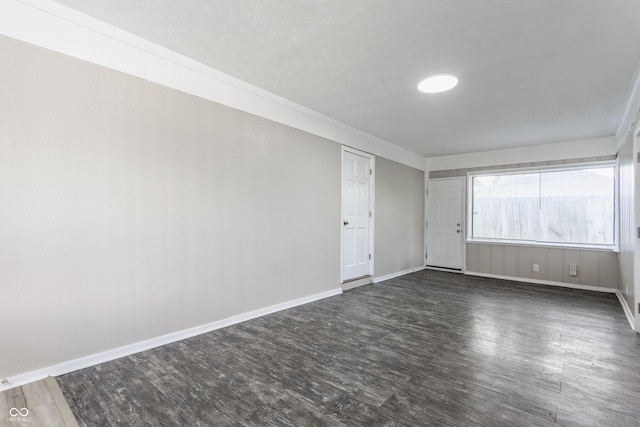 4880 N Katherine Dr, Indianapolis, IN 46226 - empty room with dark wood-style floors and crown molding