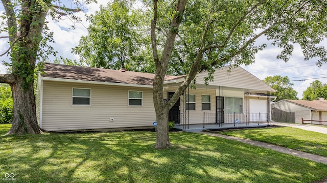 4880 N Katherine Dr, Indianapolis, IN 46226 - view of front of property with driveway and an attached garage