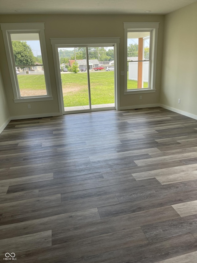 842 E Nutter St, Martinsville, IN 46151 - unfurnished room featuring baseboards and dark wood-style floors