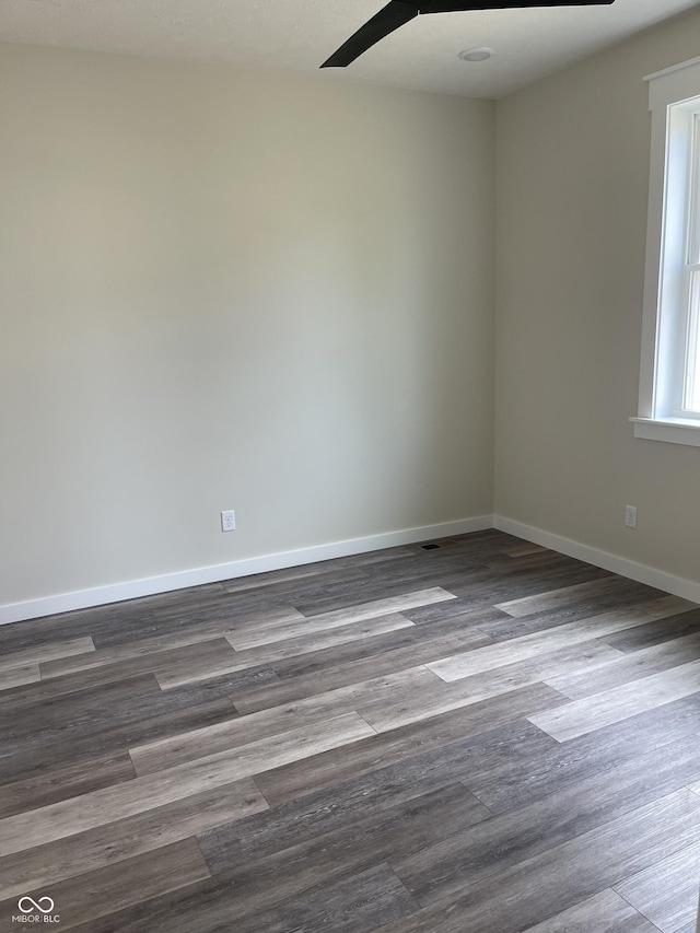 842 E Nutter St, Martinsville, IN 46151 - empty room featuring baseboards and wood finished floors