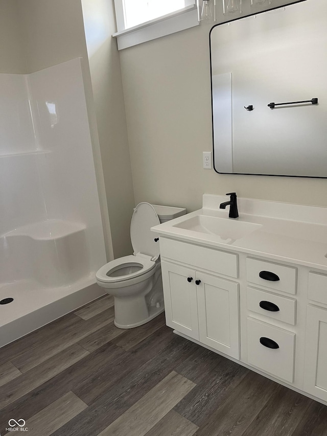 842 E Nutter St, Martinsville, IN 46151 - bathroom featuring vanity, wood finished floors, and a shower