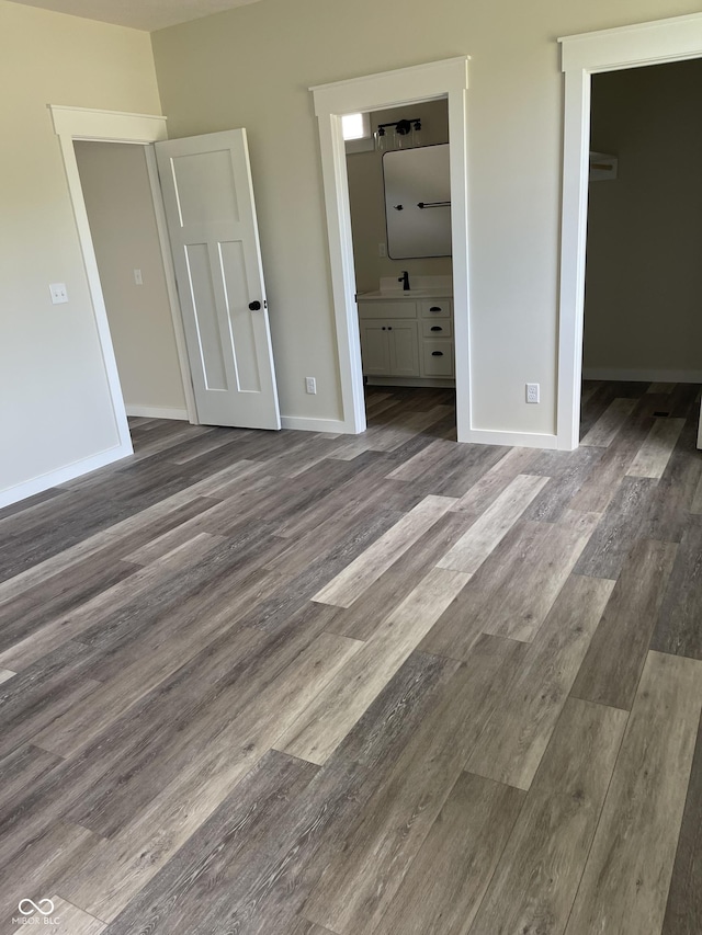 842 E Nutter St, Martinsville, IN 46151 - unfurnished bedroom with dark wood-style floors, a walk in closet, and ensuite bathroom
