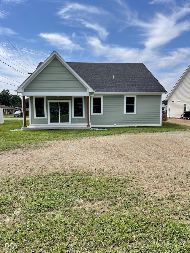 842 E Nutter St, Martinsville, IN 46151 - rear view of house featuring a yard, roof with shingles, and a porch