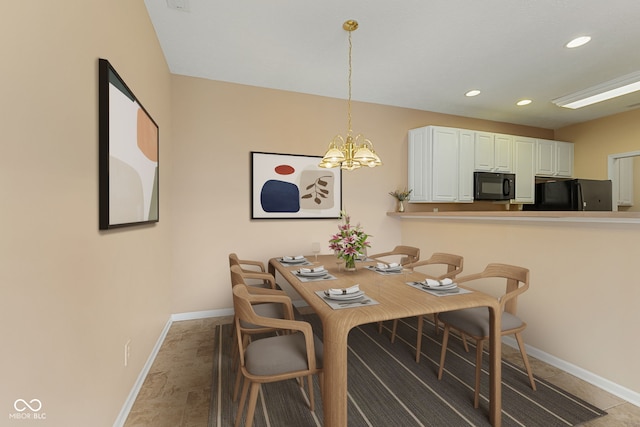 2815 Grandview Ln, Greenwood, IN 46143 - dining room featuring recessed lighting and a chandelier