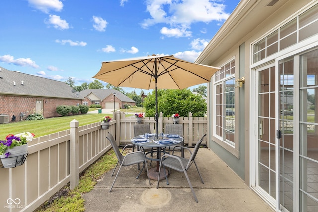2815 Grandview Ln, Greenwood, IN 46143 - fenced backyard with a patio and outdoor dining area