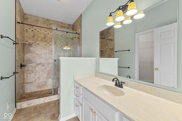 2815 Grandview Ln, Greenwood, IN 46143 - full bathroom featuring vanity, a stall shower, and a spacious closet