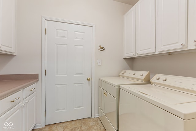 2815 Grandview Ln, Greenwood, IN 46143 - laundry room featuring separate washer and dryer and cabinet space