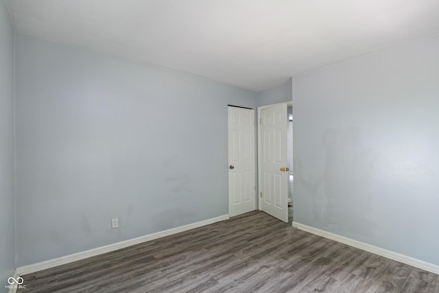 3408 Harvest Ave, Indianapolis, IN 46226 - empty room featuring wood finished floors and baseboards
