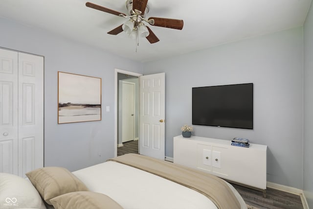 3408 Harvest Ave, Indianapolis, IN 46226 - bedroom featuring a closet, wood finished floors, and a ceiling fan