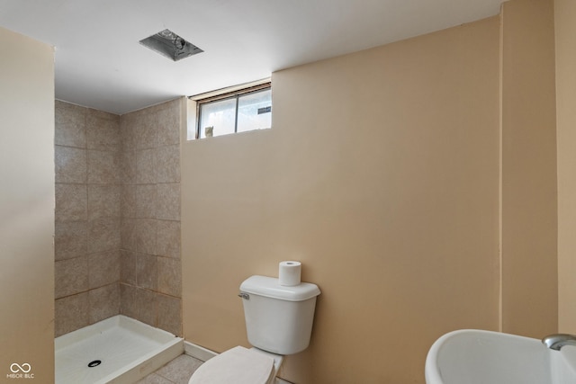 3408 Harvest Ave, Indianapolis, IN 46226 - full bathroom with tiled shower and tile patterned floors