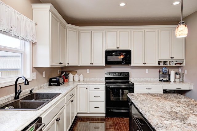 4297 W Division Rd, Crawfordsville, IN 47933 - kitchen featuring black appliances, recessed lighting, light countertops, decorative light fixtures, and dark wood finished floors