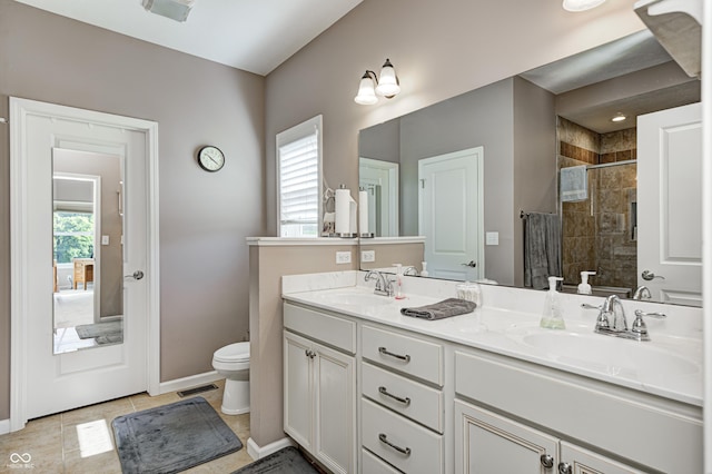 4297 W Division Rd, Crawfordsville, IN 47933 - bathroom with double vanity, a tile shower, and tile patterned floors