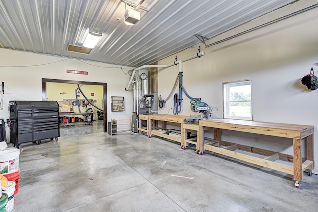 4297 W Division Rd, Crawfordsville, IN 47933 - garage featuring a workshop area and a garage door opener