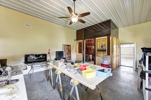4297 W Division Rd, Crawfordsville, IN 47933 - dining space featuring concrete flooring, a ceiling fan, a desk, and a high ceiling
