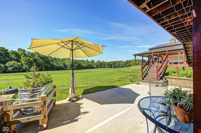 4297 W Division Rd, Crawfordsville, IN 47933 - view of patio with stairway and view of scattered trees