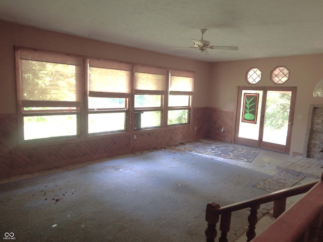3926 S County Road 550 W, Coatesville, IN 46121 - empty room featuring a wainscoted wall and a ceiling fan