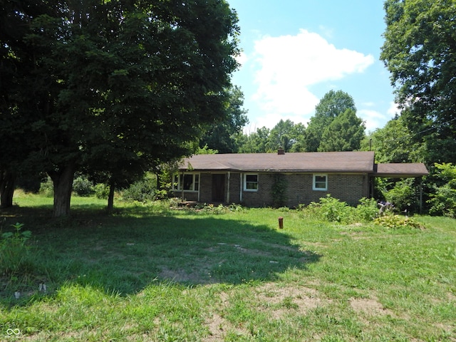 3926 S County Road 550 W, Coatesville, IN 46121 - view of front of house with brick siding and a front yard