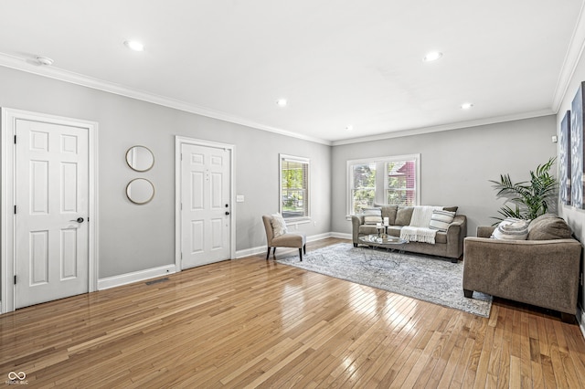 4920 Central Ave, Indianapolis, IN 46205 - living area featuring light wood-type flooring, crown molding, and recessed lighting