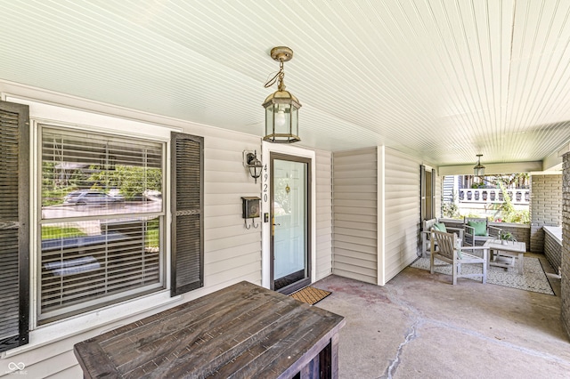 4920 Central Ave, Indianapolis, IN 46205 - view of exterior entry with a porch