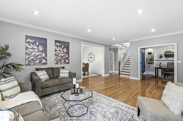 4920 Central Ave, Indianapolis, IN 46205 - living area featuring stairs, ornamental molding, wood finished floors, and recessed lighting