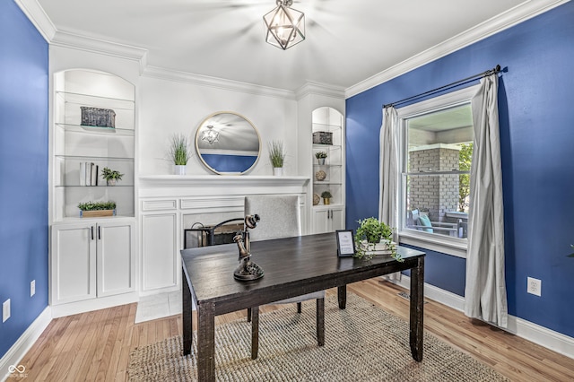 4920 Central Ave, Indianapolis, IN 46205 - office space with crown molding, light wood-style flooring, a fireplace, and built in shelves