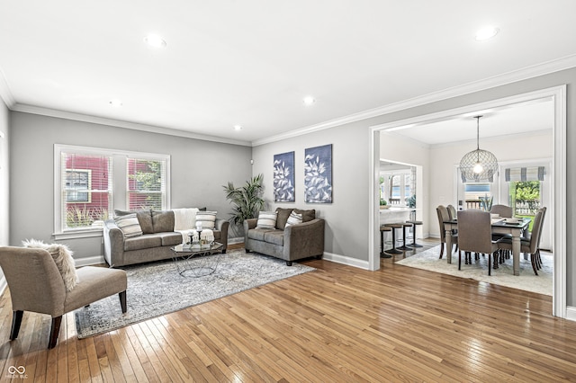 4920 Central Ave, Indianapolis, IN 46205 - living area featuring light wood-style floors, ornamental molding, and recessed lighting