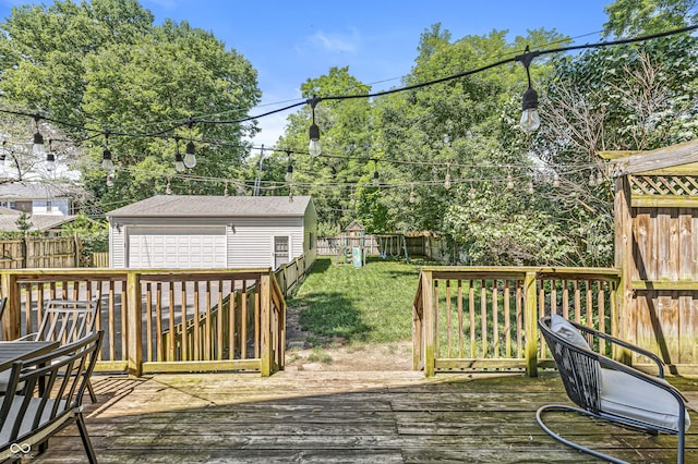 4920 Central Ave, Indianapolis, IN 46205 - deck featuring a playground, a fenced backyard, an outdoor structure, and a garage