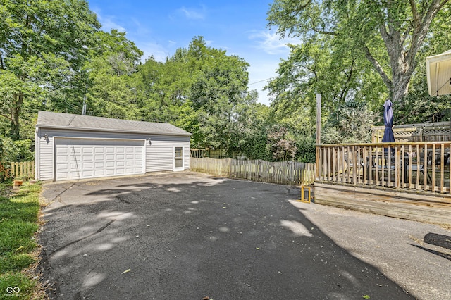 4920 Central Ave, Indianapolis, IN 46205 - detached garage featuring view of wooded area